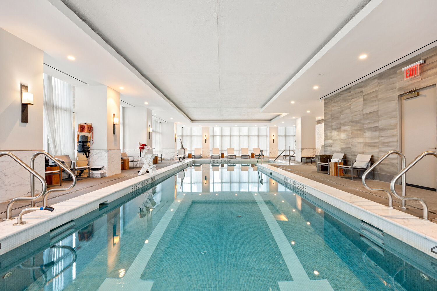 305 East 51st Street, Unit RU5H Manhattan, NY 10022 - Photo 13 of 14 a large kitchen with kitchen island a large window