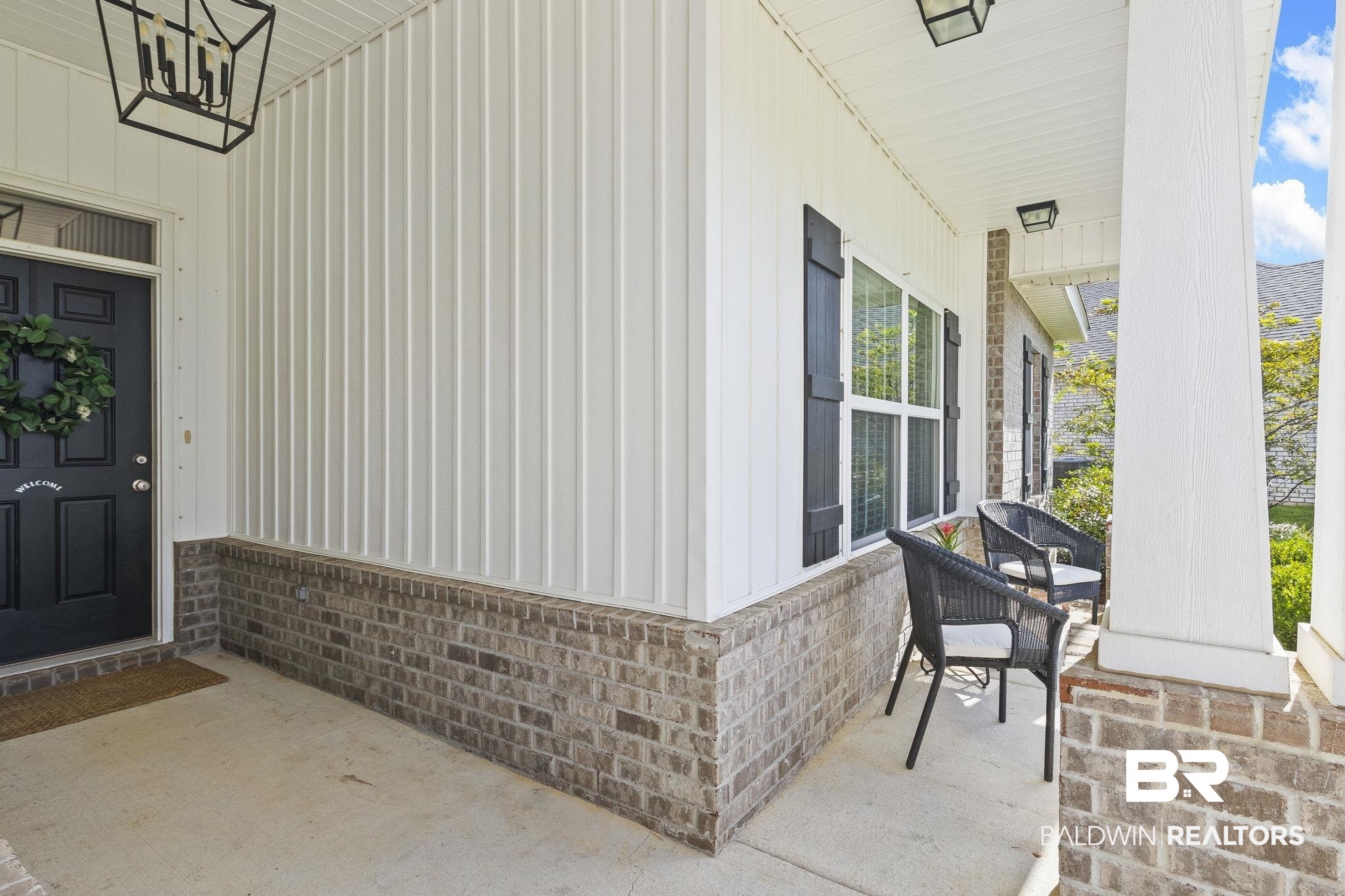 31663 Kestrel Loop Daphne, AL 36527 - Photo 10 of 86 Doorway to property featuring covered porch