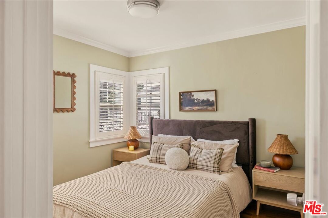 3764 Valleybrink Road Los Angeles, CA 90039 - Photo 16 of 35 a bedroom with a bed and a window