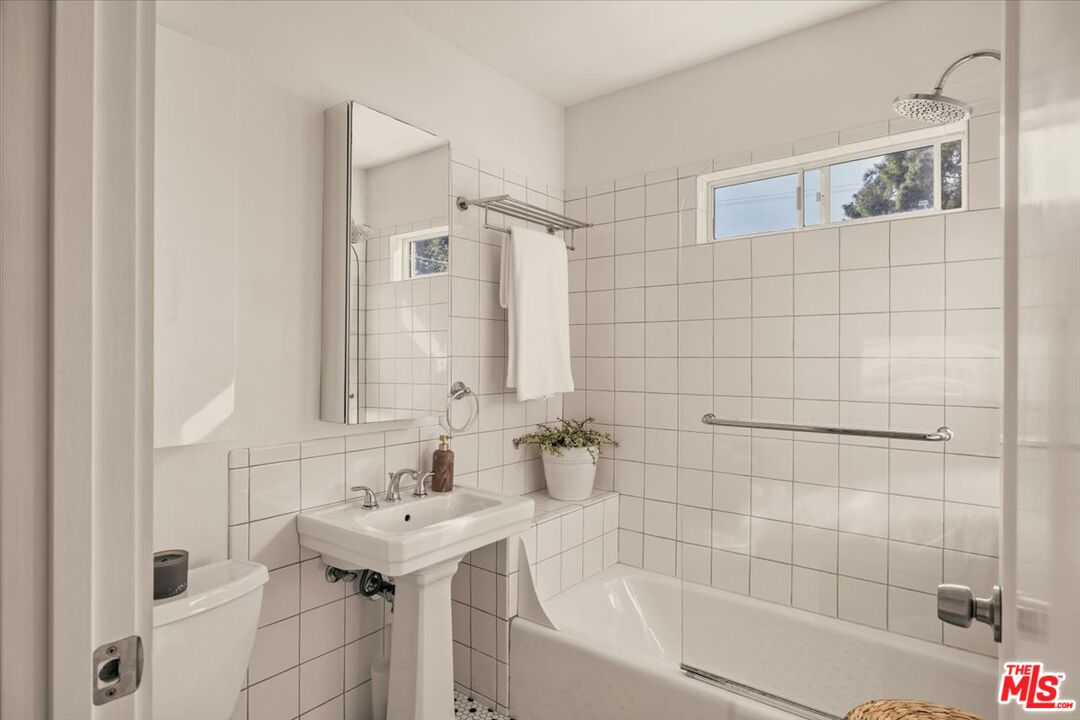 3764 Valleybrink Road Los Angeles, CA 90039 - Photo 18 of 35 a bathroom with a sink shower and bathtub