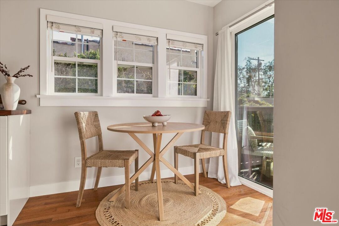 3764 Valleybrink Road Los Angeles, CA 90039 - Photo 21 of 35 a dining room with furniture and window