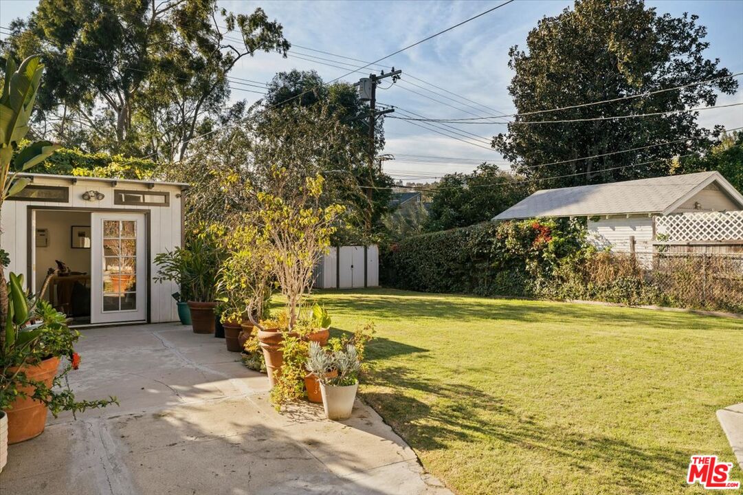 3764 Valleybrink Road Los Angeles, CA 90039 - Photo 27 of 35 a view of a swimming pool with a patio