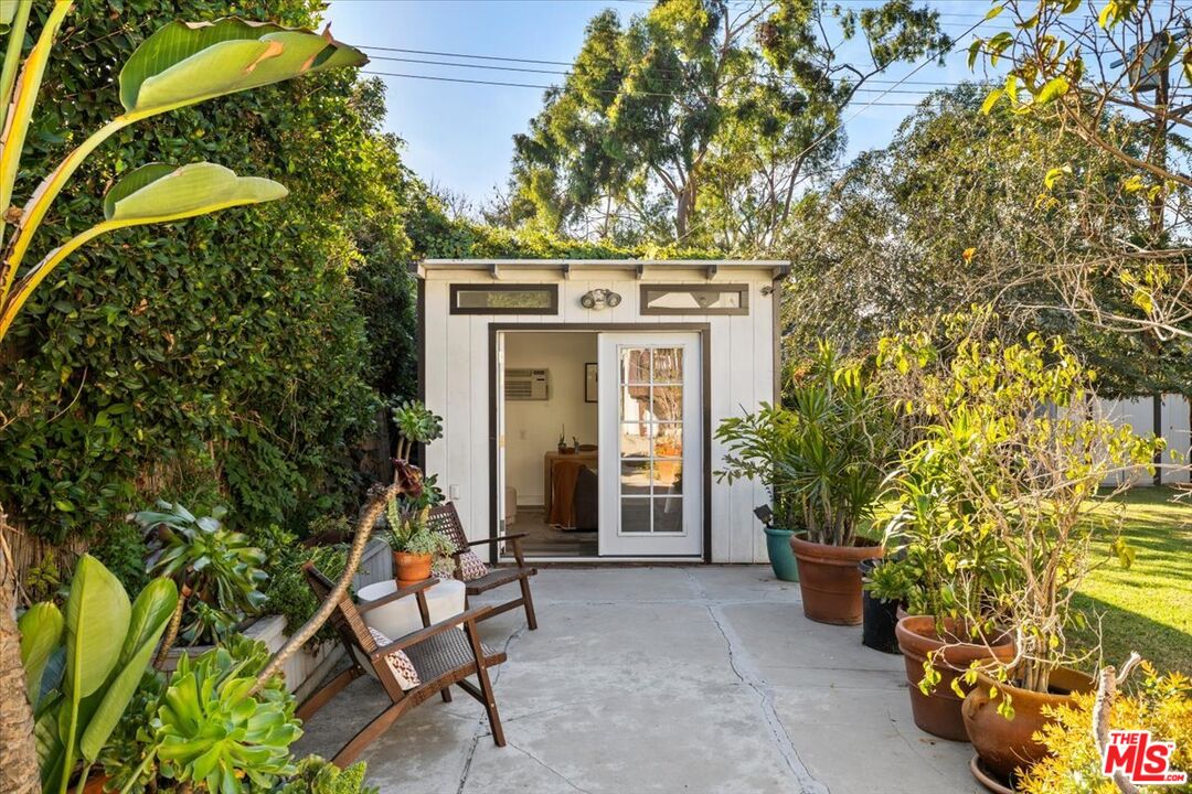 3764 Valleybrink Road Los Angeles, CA 90039 - Photo 28 of 35 a view of an chairs and table in the patio