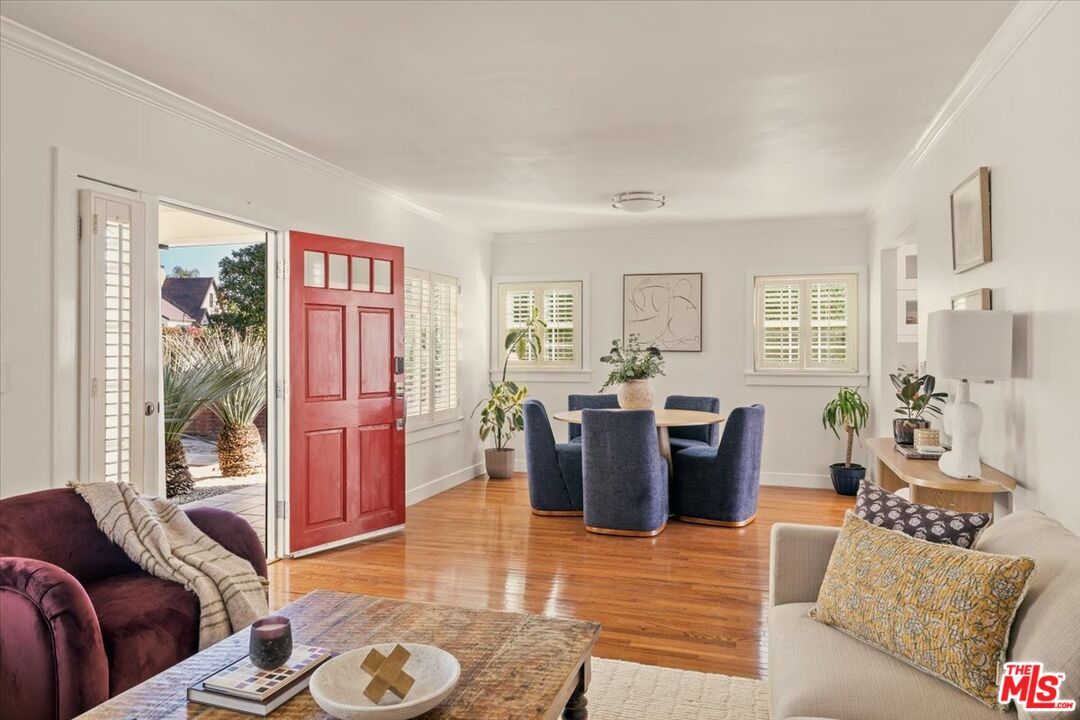 3764 Valleybrink Road Los Angeles, CA 90039 - Photo 5 of 35 a living room with furniture or couch and a window
