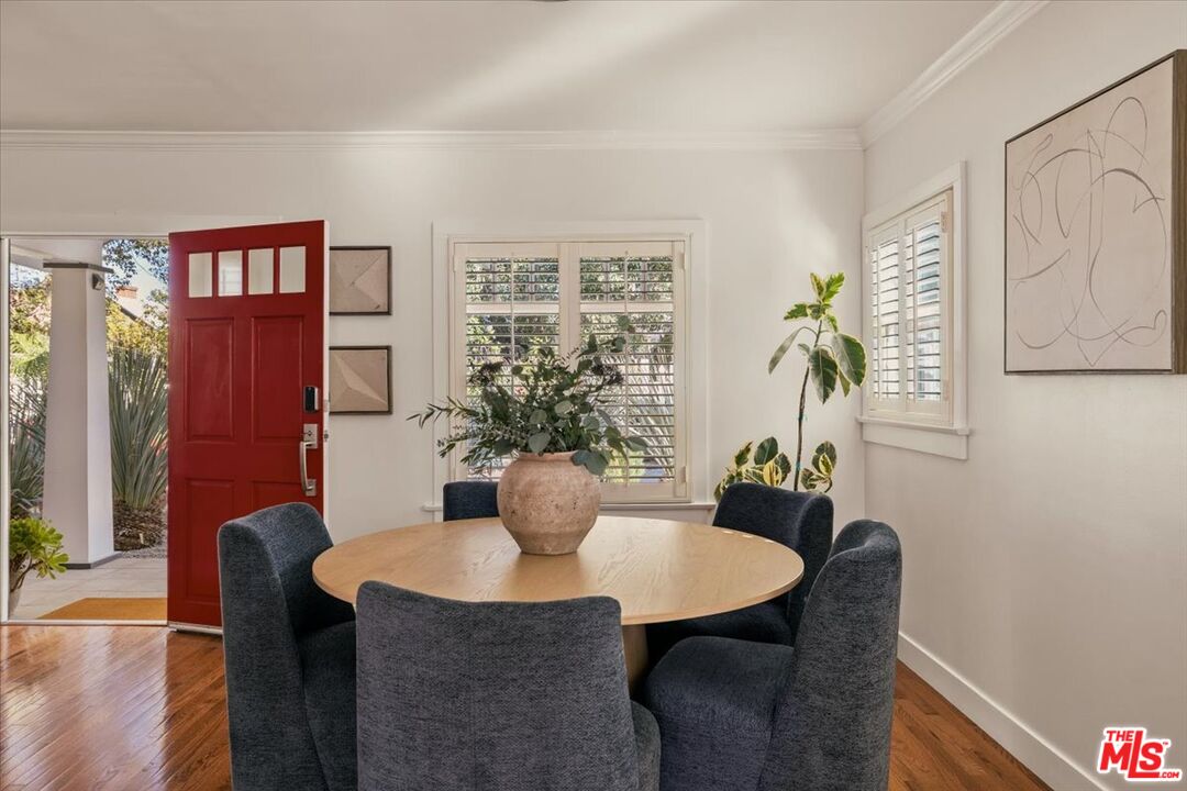 3764 Valleybrink Road Los Angeles, CA 90039 - Photo 8 of 35 a dining room with furniture and wooden floor