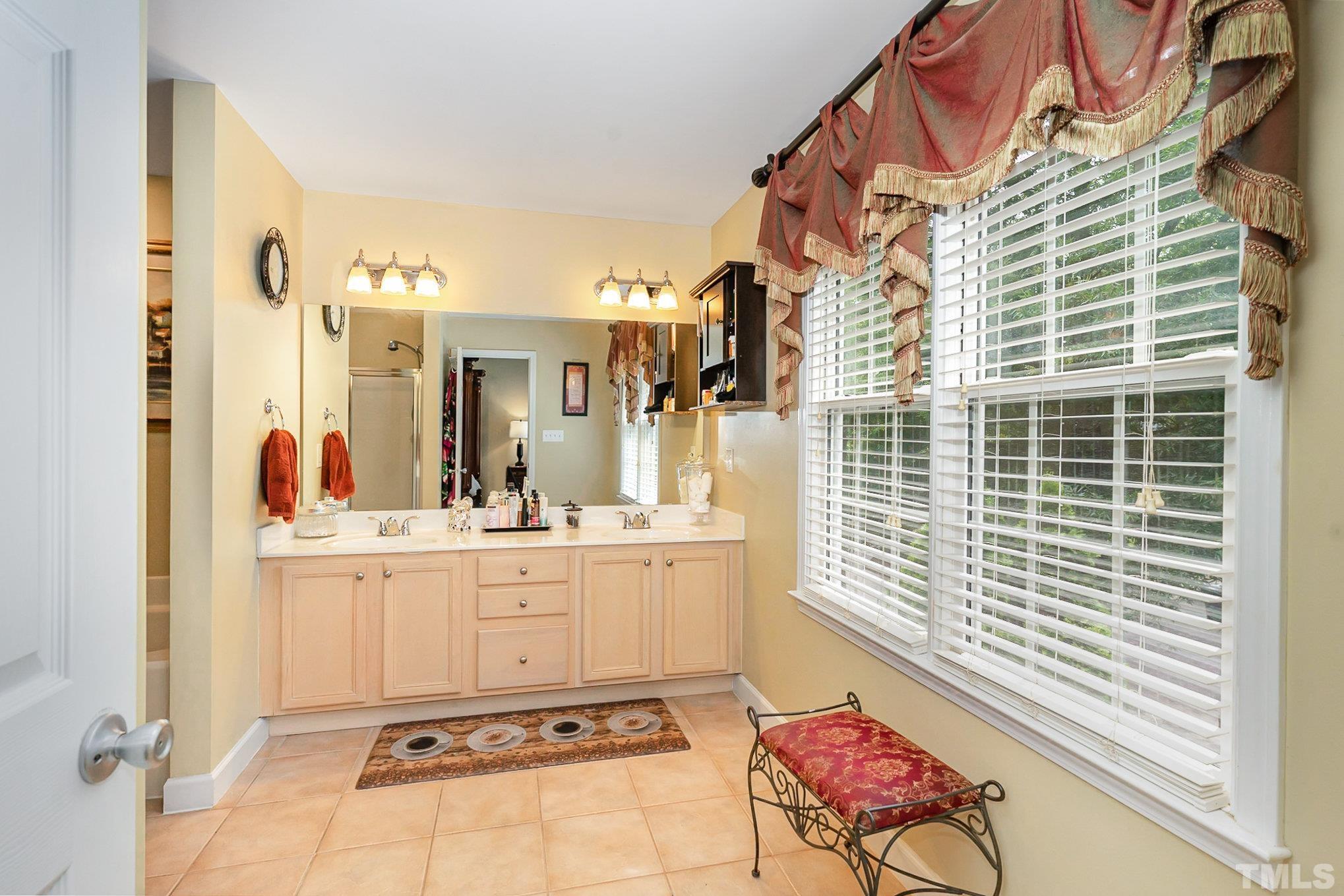 6026 Kohler Lane Raleigh, NC 27616 - Photo 12 of 15 a living room with fireplace furniture and a window
