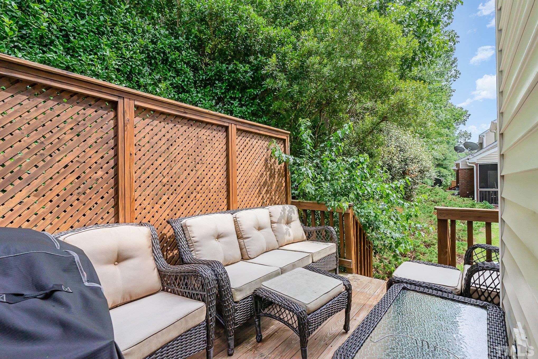6026 Kohler Lane Raleigh, NC 27616 - Photo 15 of 15 a balcony with furniture and a potted plant