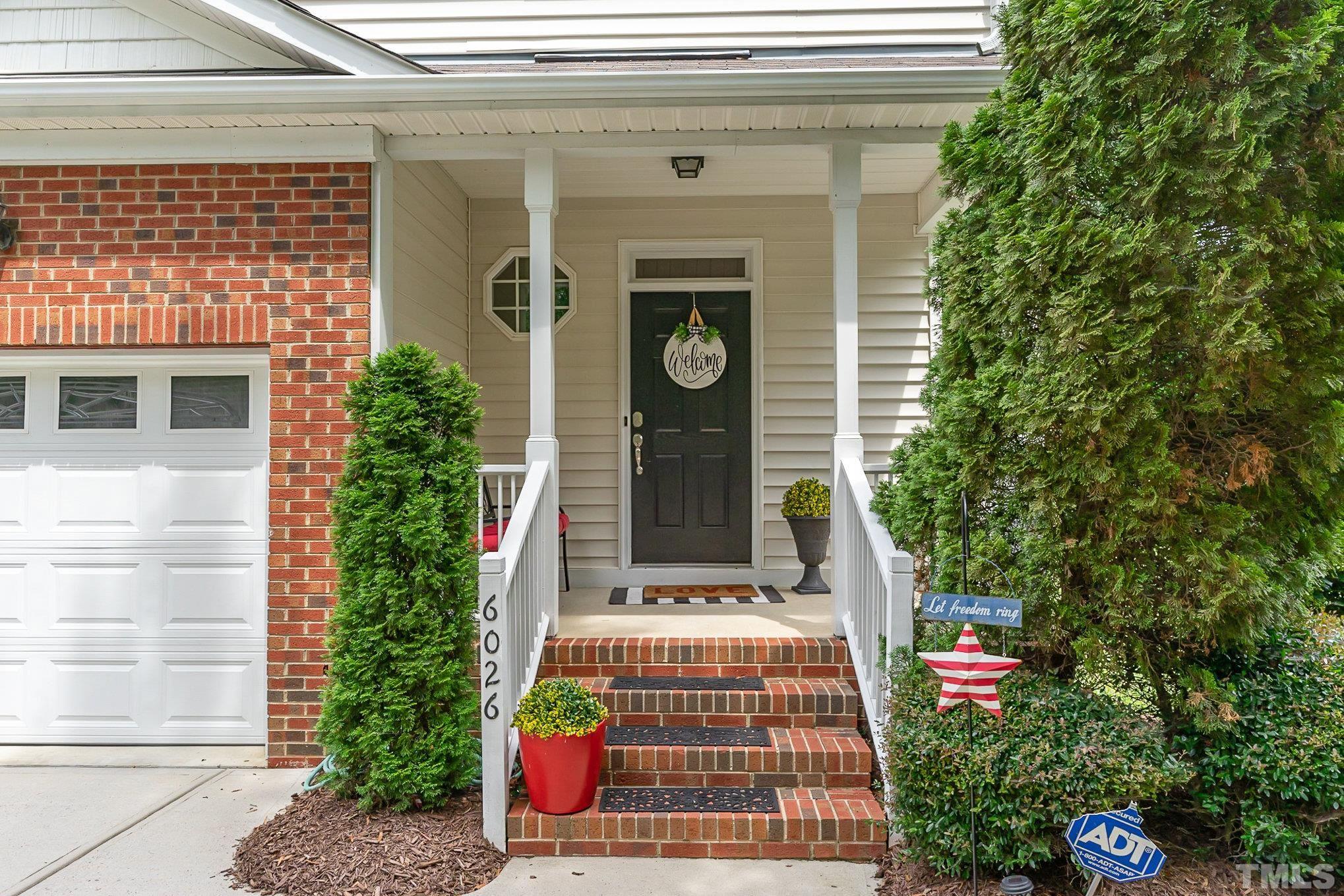 6026 Kohler Lane Raleigh, NC 27616 - Photo 4 of 15 a front view of a house with plants