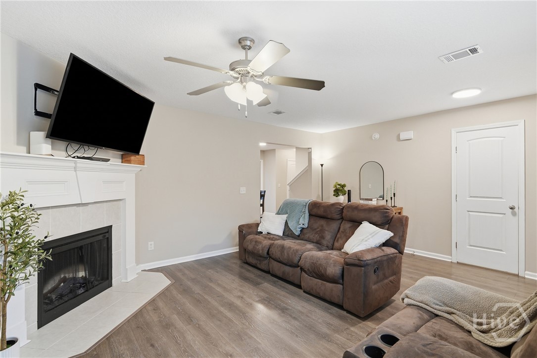 14 Griffin Road Allenhurst, GA 31301 - Photo 4 of 33 living room with fireplace