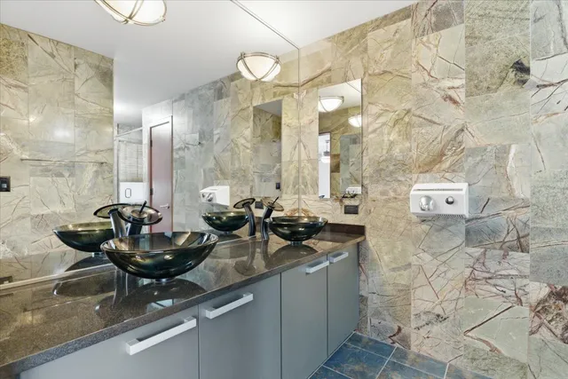 a bathroom with a bathtub and a toilet