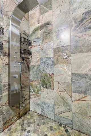 a view of an empty room with a fireplace