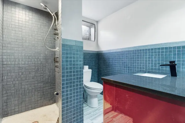 a view of an empty room with storage