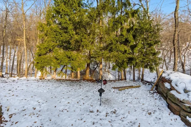 a view of snow on the side of a road