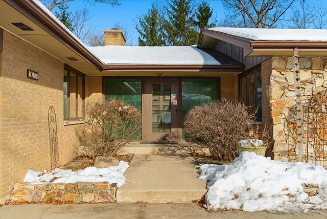 a view of a entryway door front of house