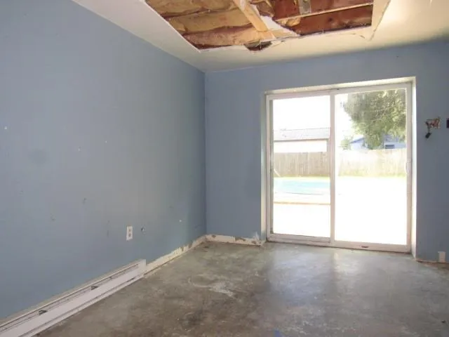 an empty room with windows