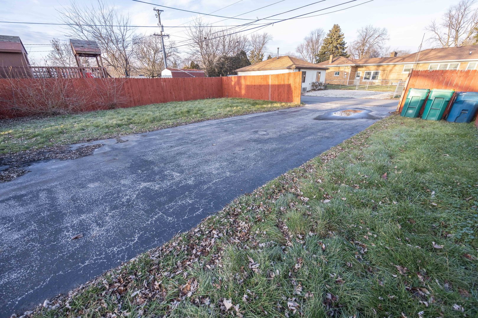 2024 Plainfield Road Crest Hill, IL 60403 - Photo 19 of 20 a backyard of a house with barbeque oven table and chairs