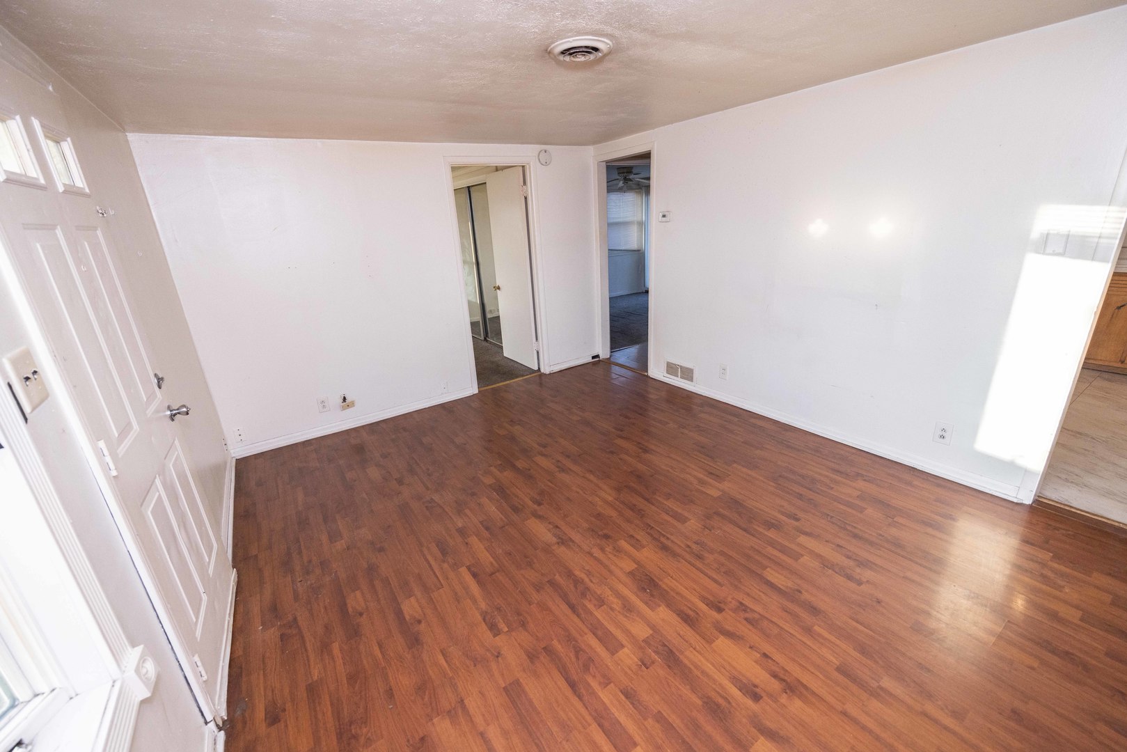 2024 Plainfield Road Crest Hill, IL 60403 - Photo 3 of 20 a view of empty room with wooden floor
