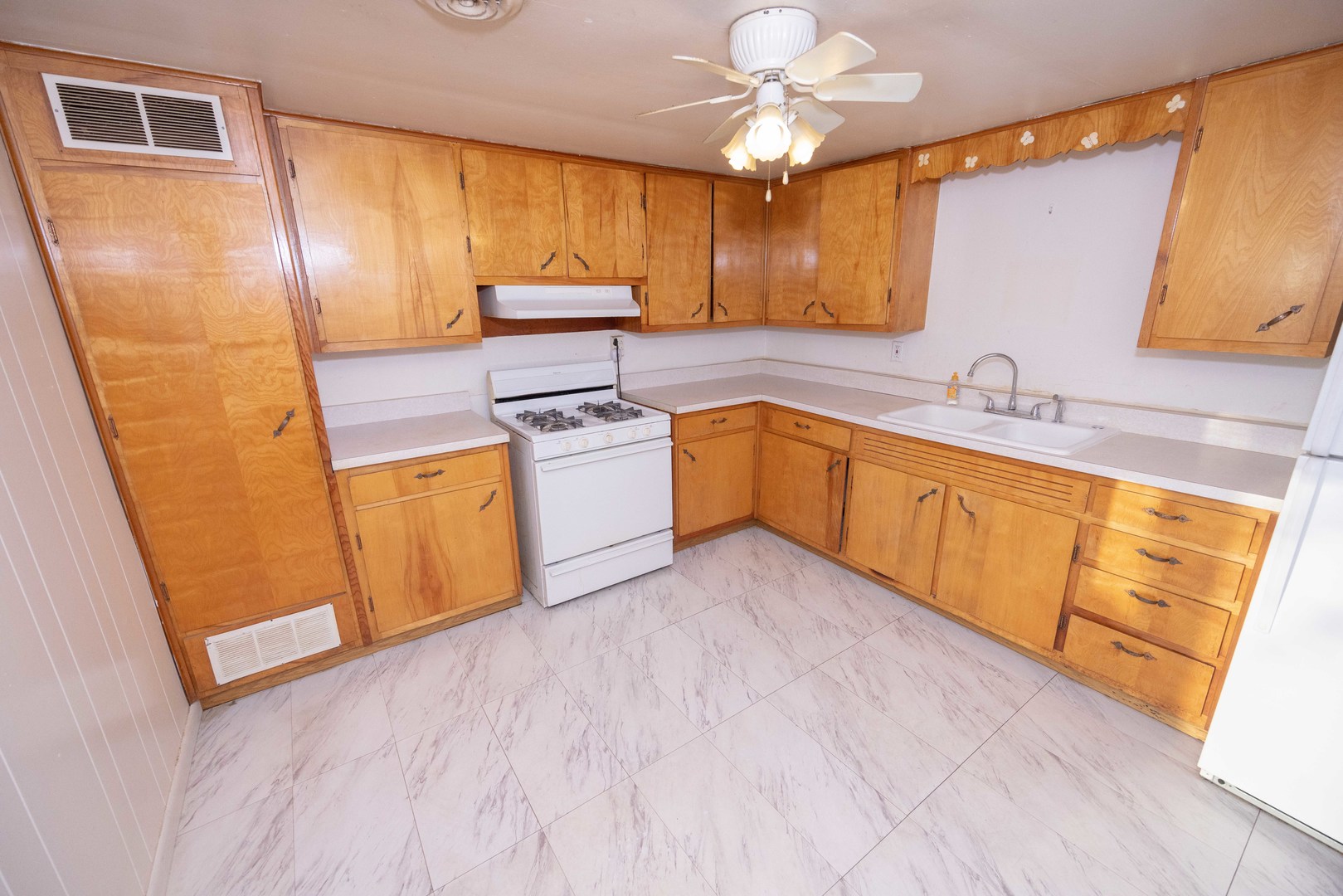 2024 Plainfield Road Crest Hill, IL 60403 - Photo 4 of 20 a kitchen with stainless steel appliances granite countertop a sink dishwasher stove and refrigerator