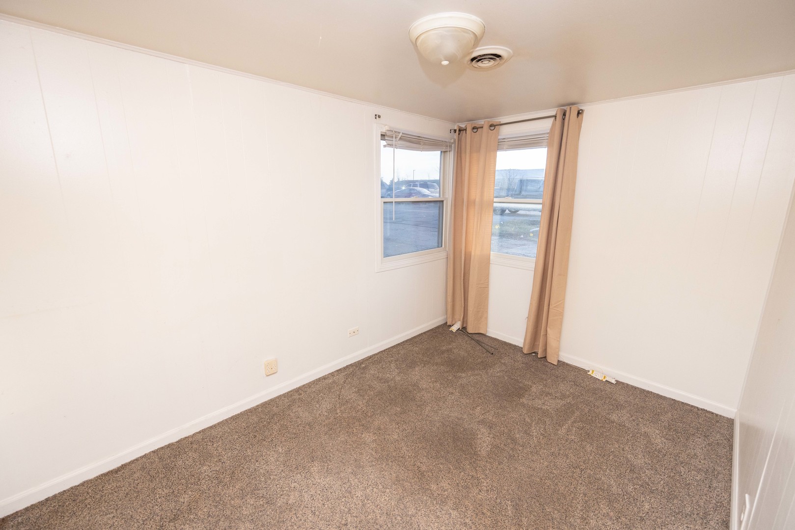 2024 Plainfield Road Crest Hill, IL 60403 - Photo 10 of 20 a view of an empty room with a window