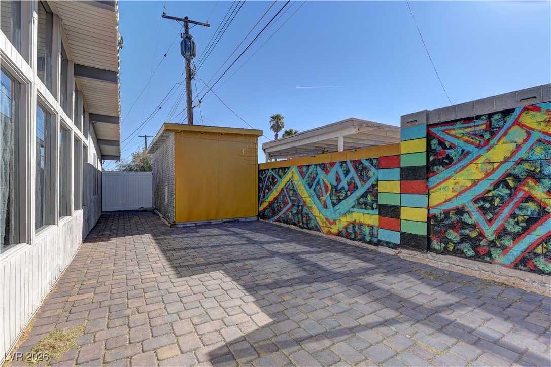 6309 Rassler Avenue Las Vegas, NV 89107 - Photo 18 of 19 View of patio / terrace with a shed