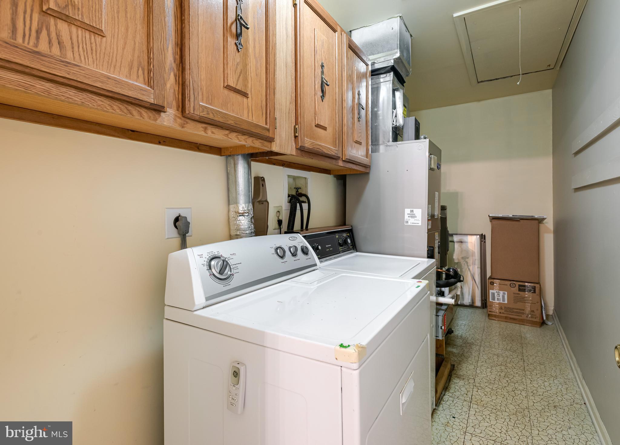 1108 Bartlett Road, Unit 170 Chesterbrook, PA 19087 - Photo 21 of 22 a utility room with dryer and washer