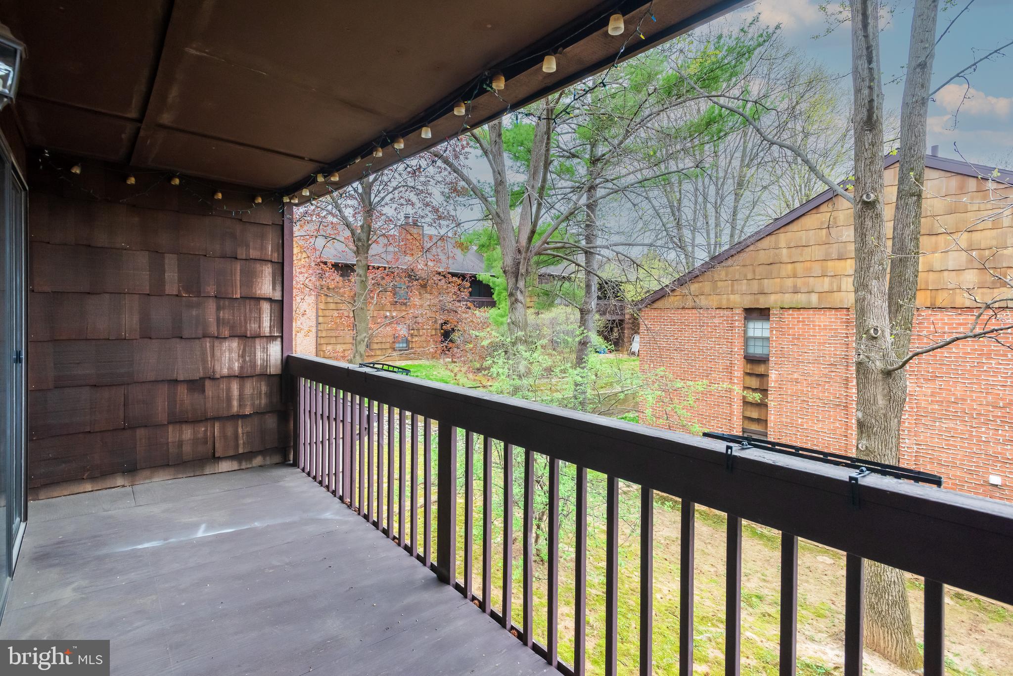 1108 Bartlett Road, Unit 170 Chesterbrook, PA 19087 - Photo 22 of 22 a view of balcony with wooden floor