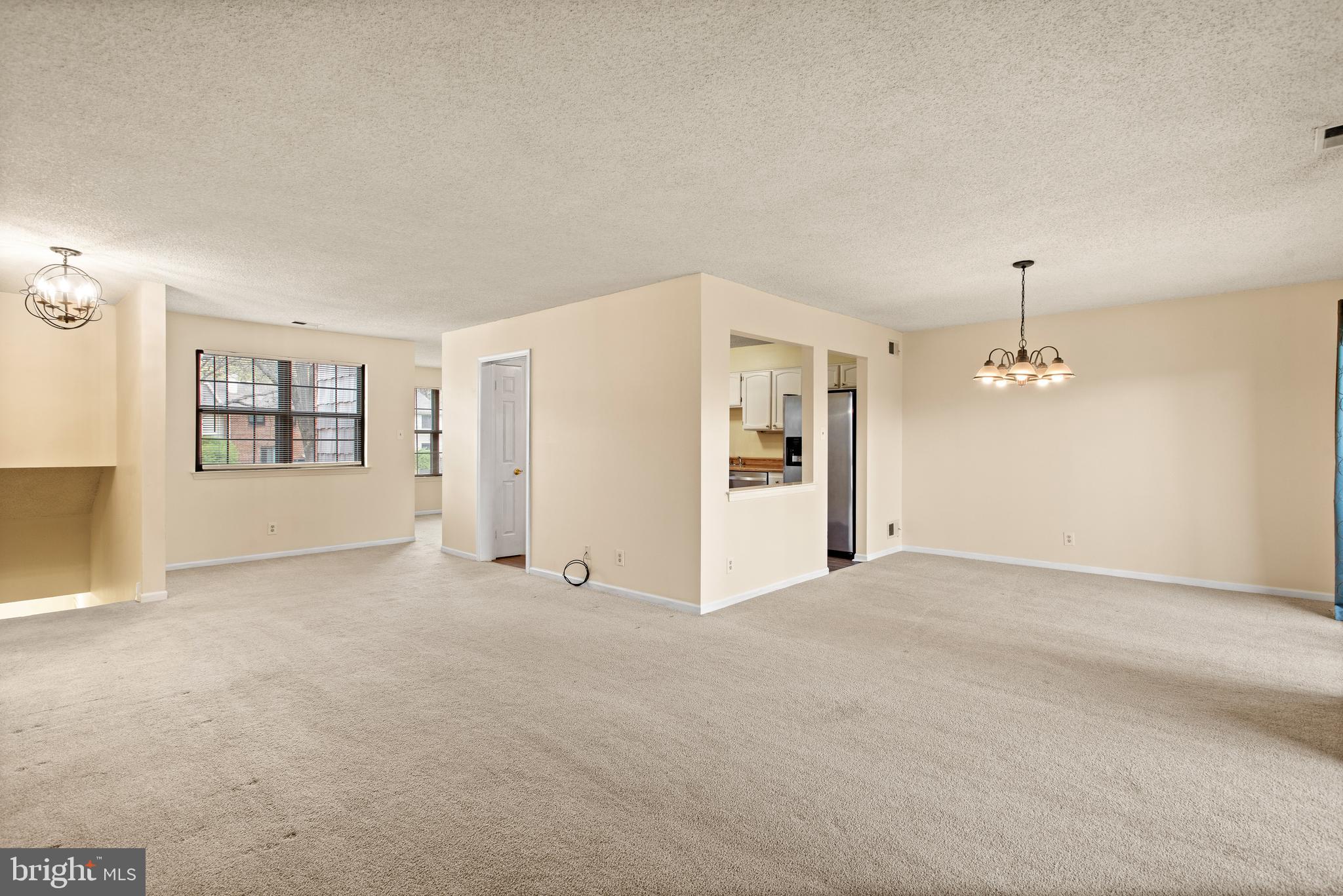 1108 Bartlett Road, Unit 170 Chesterbrook, PA 19087 - Photo 3 of 22 an empty room with windows and closet