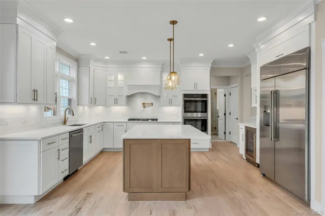 a large kitchen with cabinets
