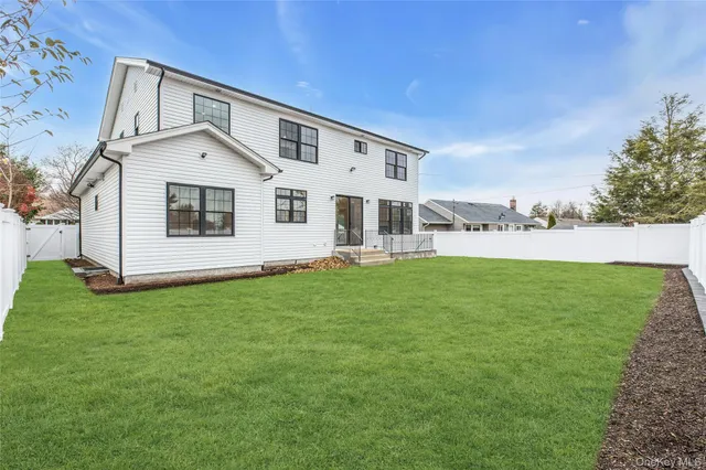 a view of a room with wooden walls