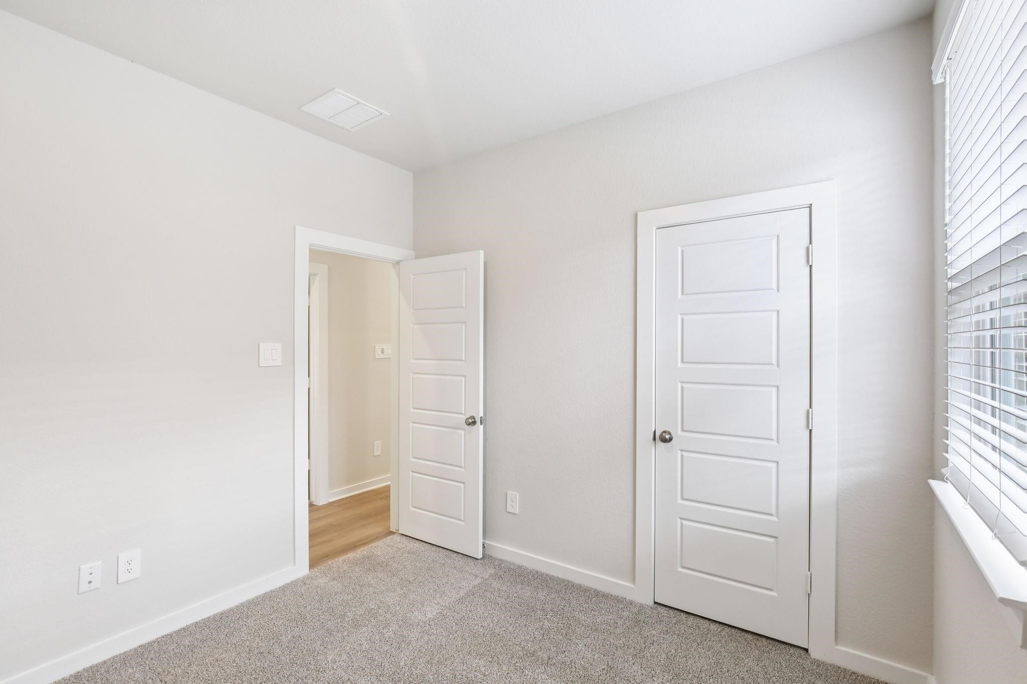 6717 Chinapkin Lane Conroe, TX 77304 - Photo 10 of 15 an empty room with windows