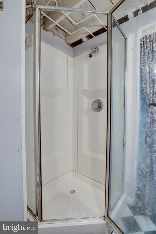 3574 Benzinger Road Baltimore, MD 21229 - Photo 24 of 29 Modern shower space with sleek design.
