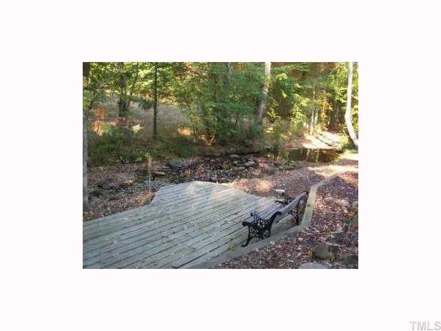 2147 Jimmie Kerr Road Graham, NC 27253 - Photo 4 of 9 AHHH!!!! Enjoy nature and this great creek from the multi level decking