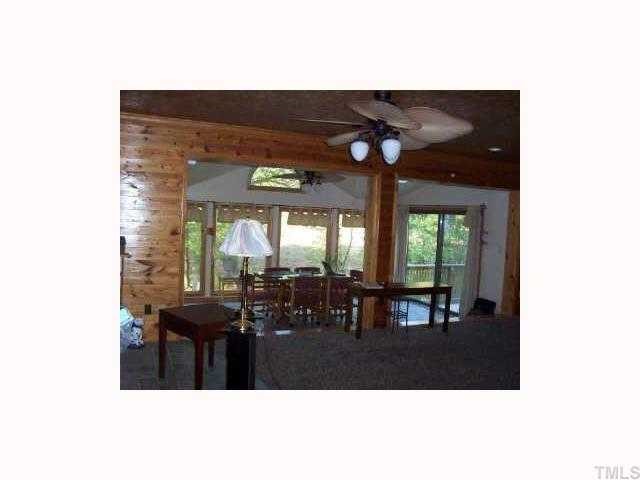 2147 Jimmie Kerr Road Graham, NC 27253 - Photo 6 of 9 Large great room looking into tiled sunroom. Take advantage of the views!