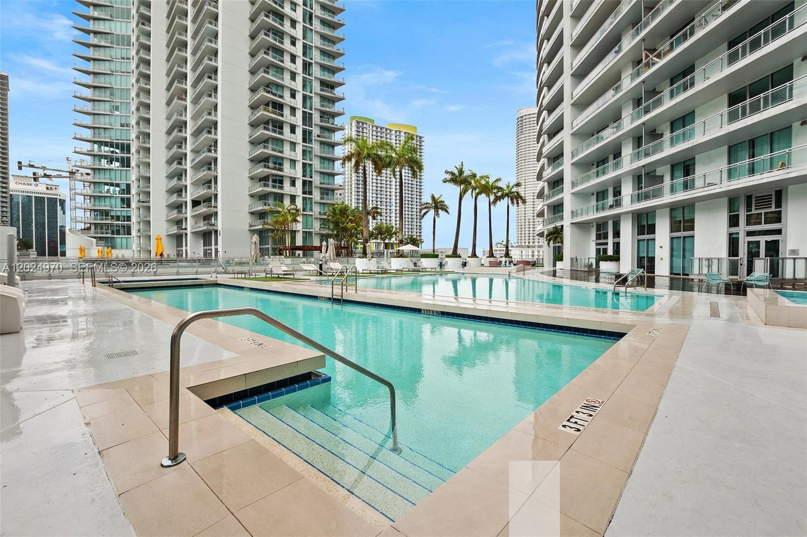 90 Southwest 3rd Street, Unit 3810 Miami, FL 33130 - Photo 31 of 45 a view of swimming pool with outdoor seating and city view