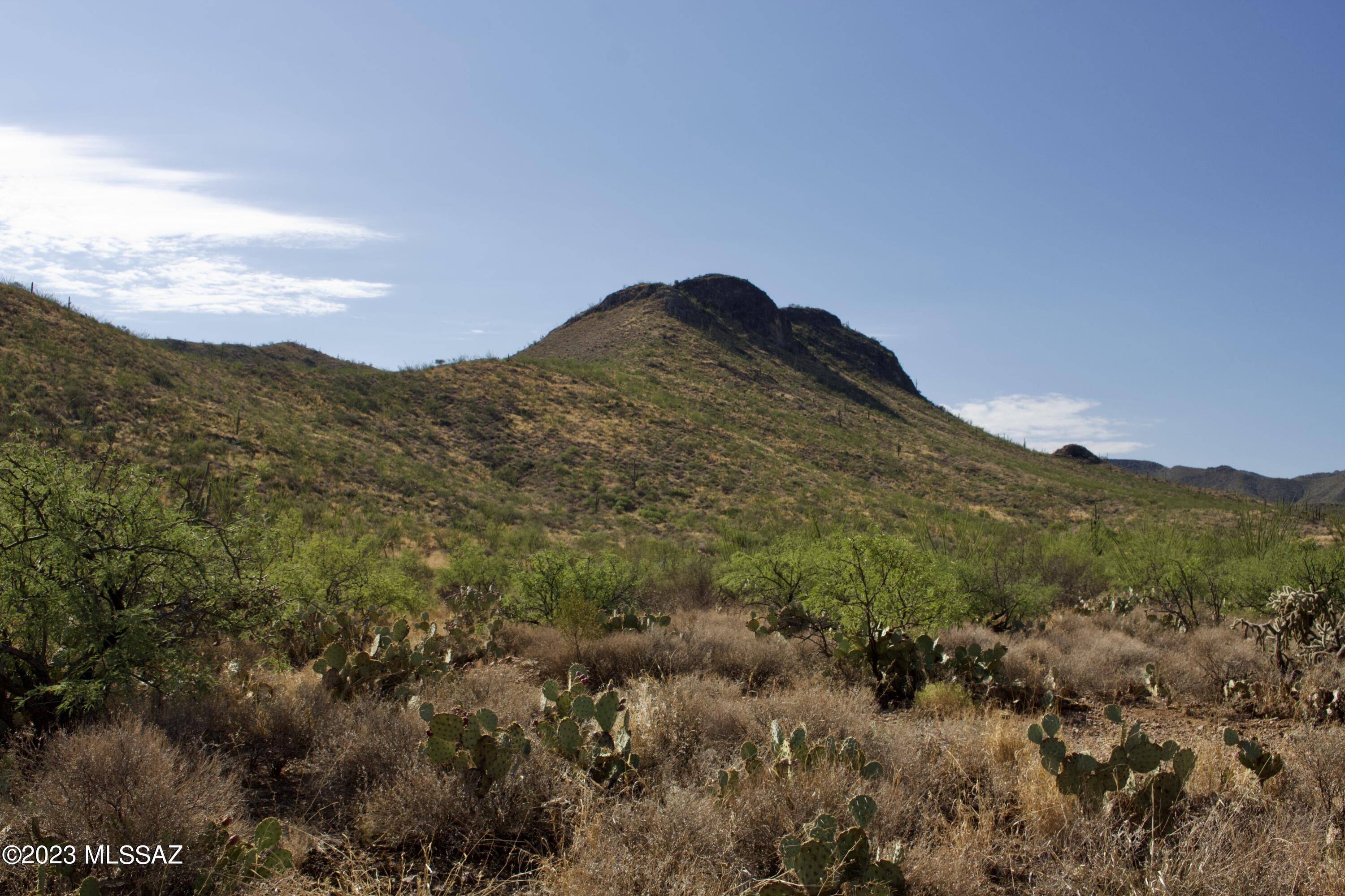 9720 East Ocotillo Rim Trail Vail, AZ 85641 - Photo 1 of 6 Permits approved for this to be the back yard view of the home.