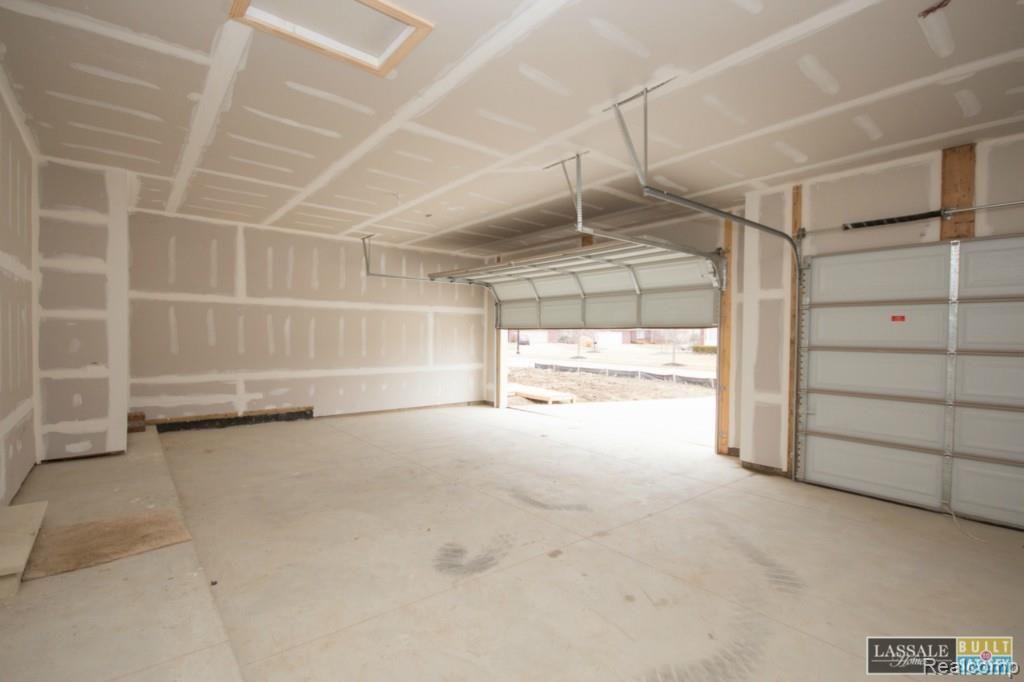 22654 Brantingham Road Macomb, MI 48044 - Photo 5 of 32 2 Lot 92 Bluffs of Beaufait Gia Ranch Spec Home Garage 3-30-14.jpg