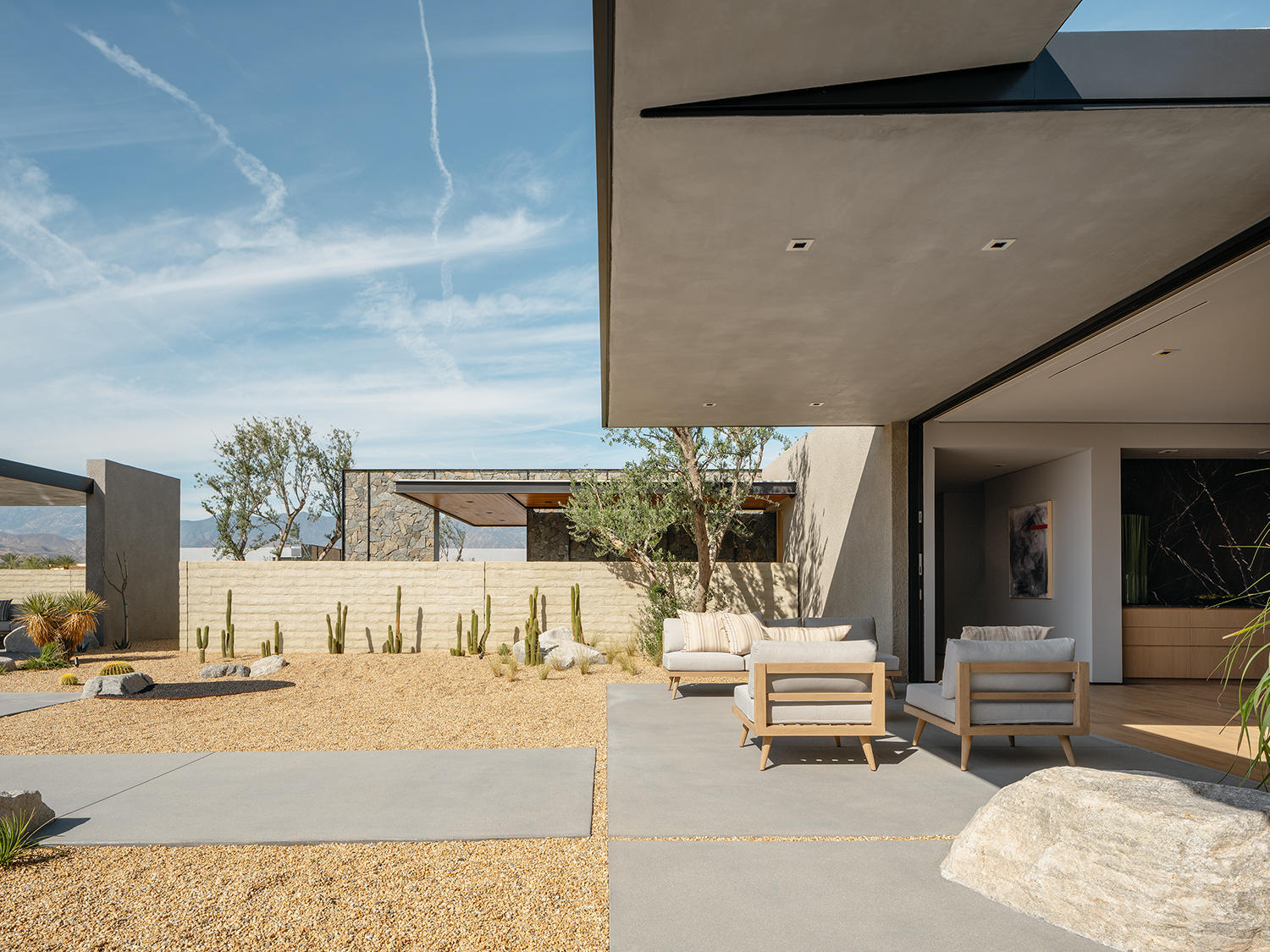 4 Echo Lane Rancho Mirage, CA 92270 - Photo 3 of 40 a living room with furniture and a couch