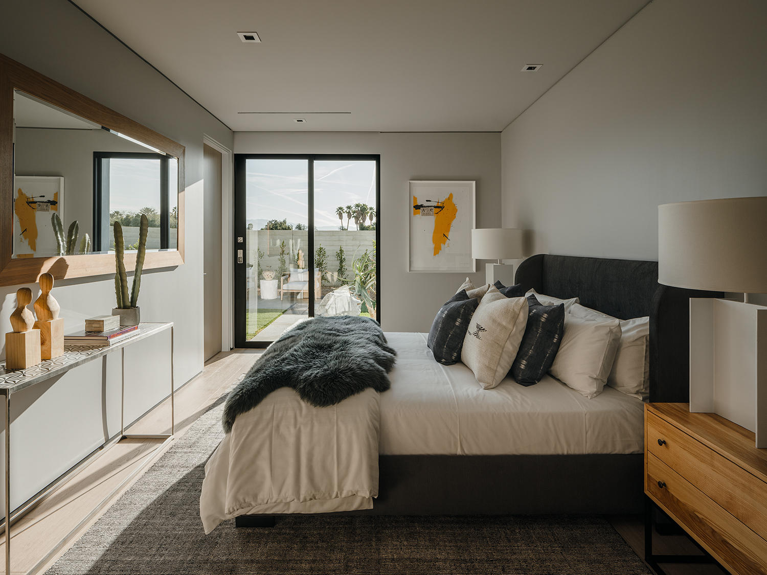 4 Echo Lane Rancho Mirage, CA 92270 - Photo 22 of 40 a bedroom with a bed and a large window