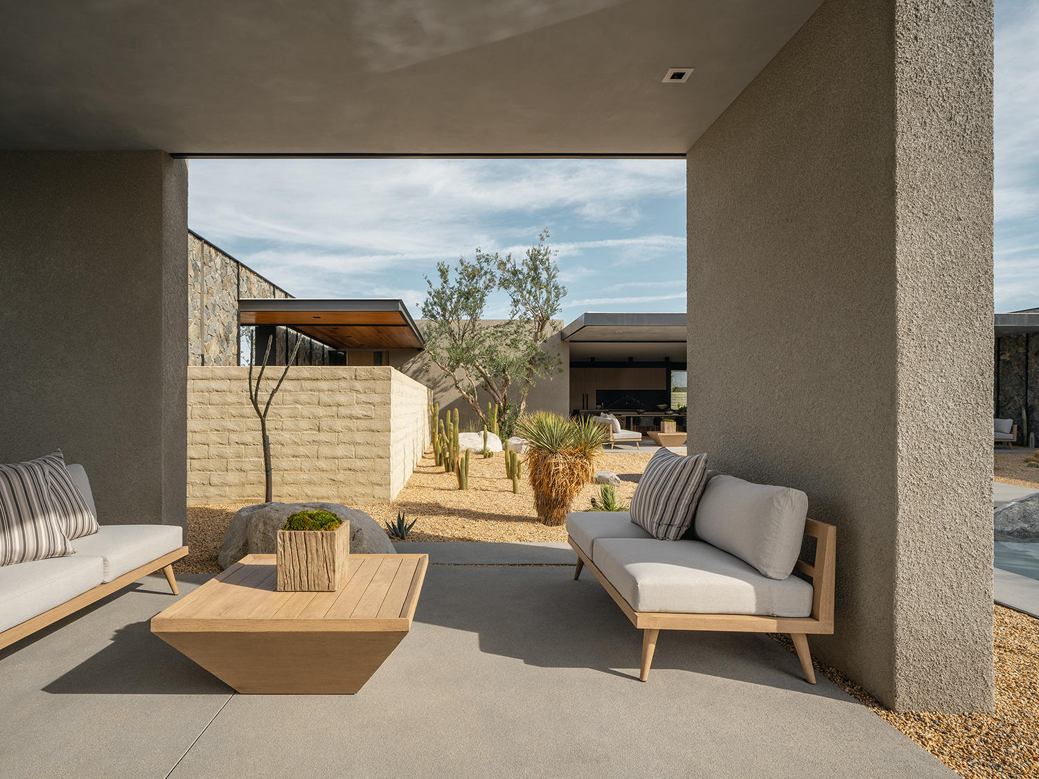 4 Echo Lane Rancho Mirage, CA 92270 - Photo 38 of 40 a living room with furniture and a fireplace