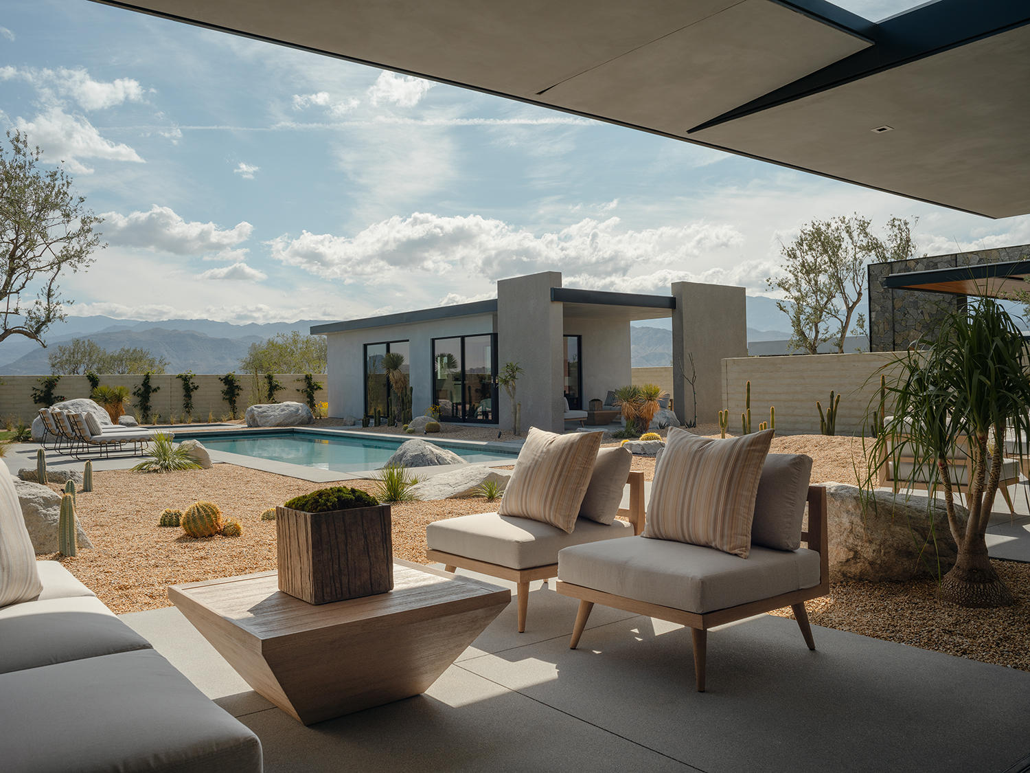 4 Echo Lane Rancho Mirage, CA 92270 - Photo 40 of 40 a outdoor space with patio the couches and a fireplace