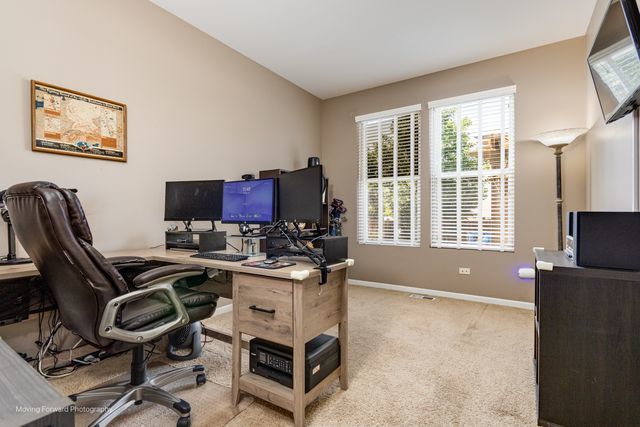 103 South Cranberry Street Bolingbrook, IL 60490 - Photo 13 of 33 a view of a workspace with furniture and a window