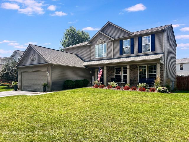 103 South Cranberry Street Bolingbrook, IL 60490 - Photo 2 of 33 a front view of a house with a yard and porch