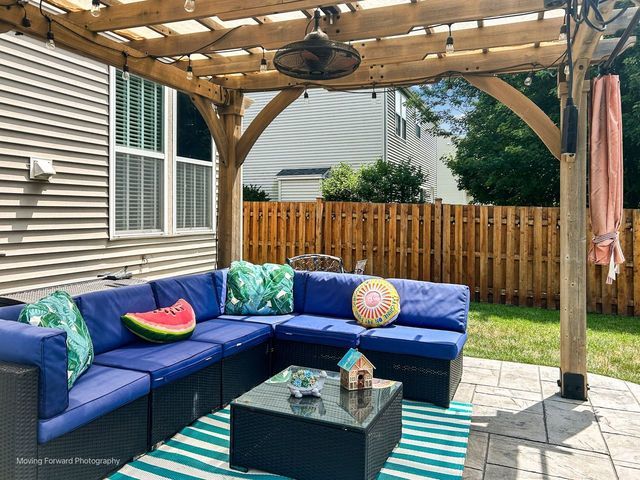 103 South Cranberry Street Bolingbrook, IL 60490 - Photo 30 of 33 a outdoor living space with furniture and a garden