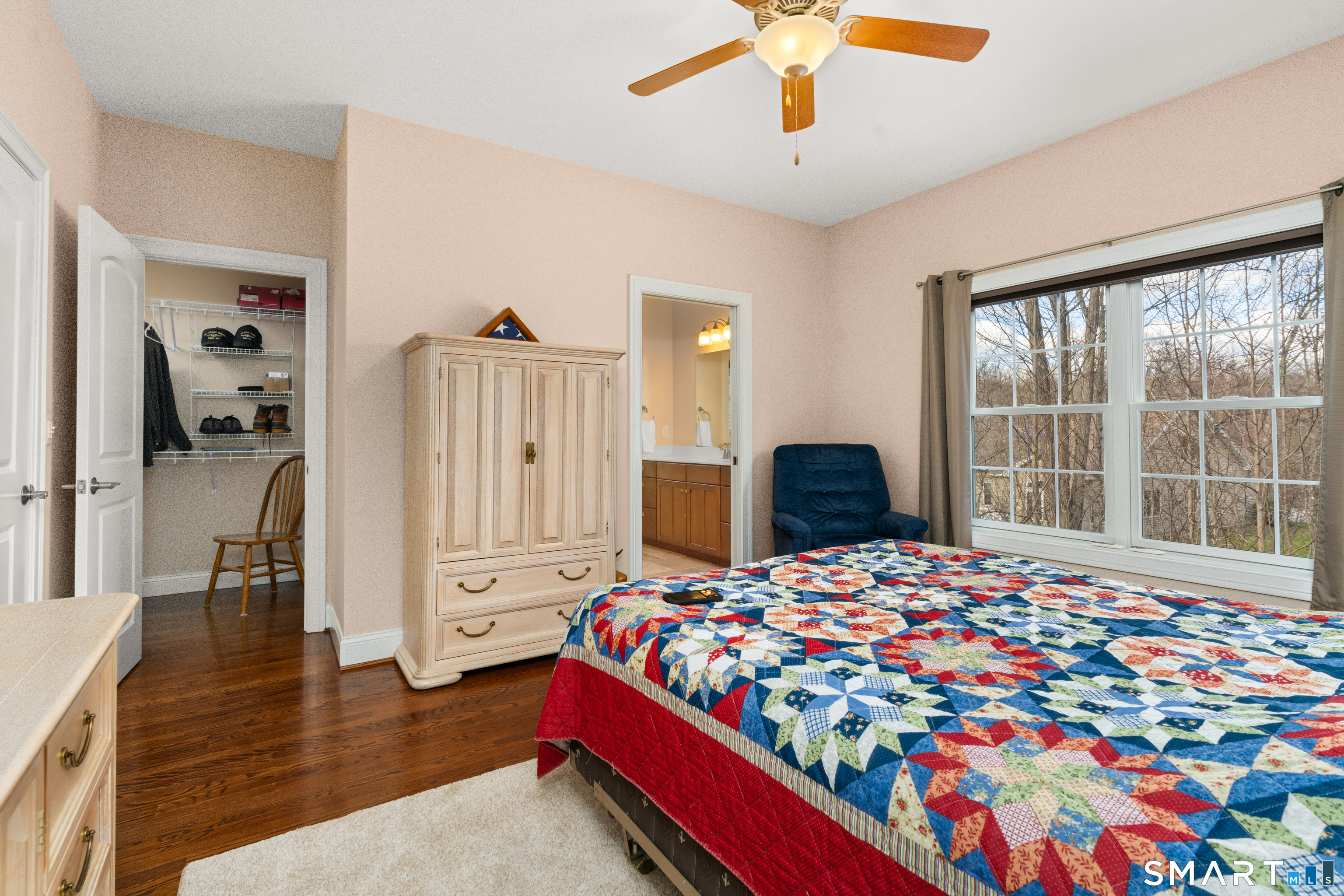 24 Center Court, Unit 24 Colchester, CT 06415 - Photo 13 of 36 a bedroom with a bed dresser and a window