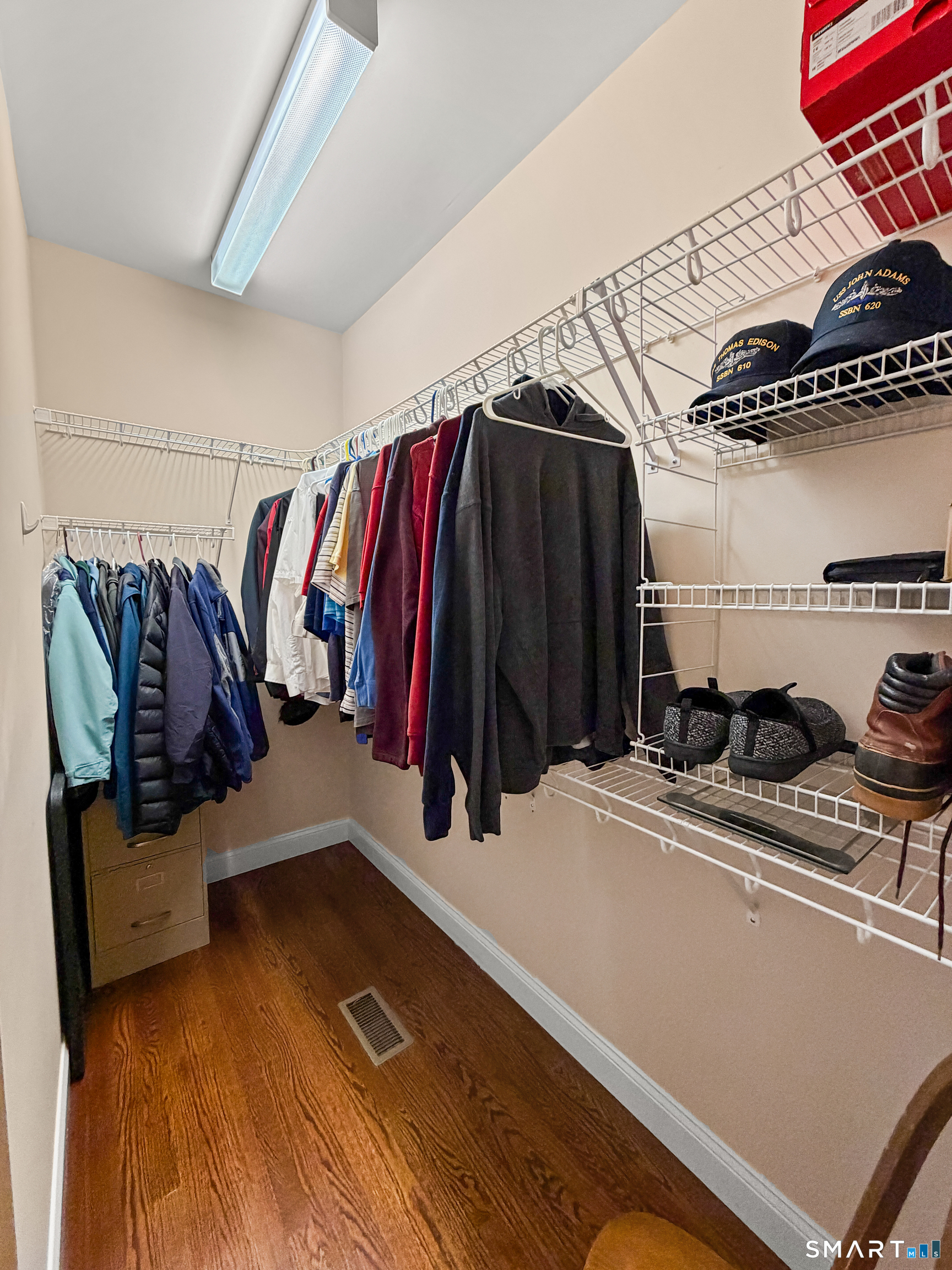 24 Center Court, Unit 24 Colchester, CT 06415 - Photo 17 of 36 a view of walk in closet with clothes and shoes