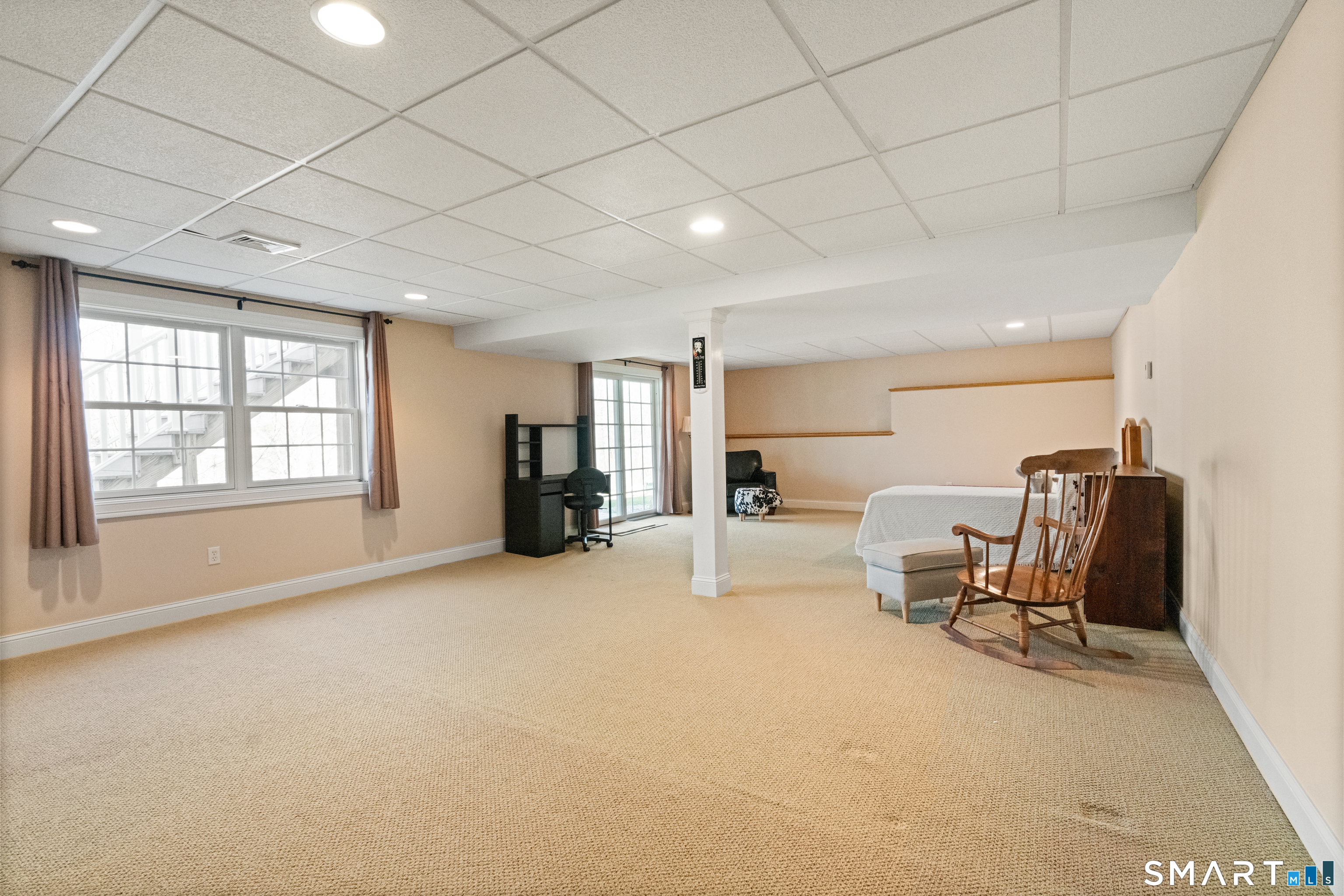 24 Center Court, Unit 24 Colchester, CT 06415 - Photo 24 of 36 a view of a livingroom with furniture and a window