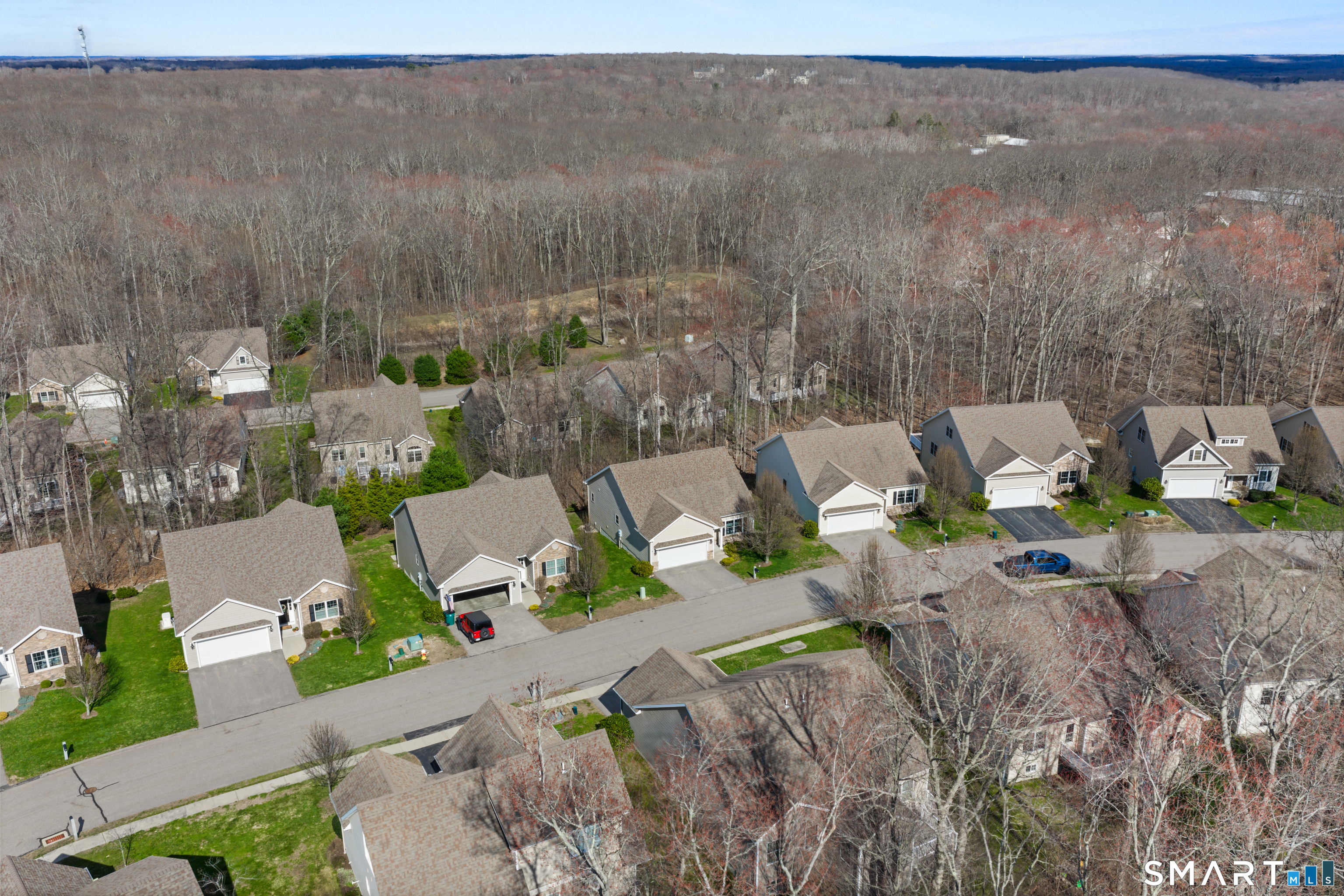 24 Center Court, Unit 24 Colchester, CT 06415 - Photo 35 of 36 a view of a house with a yard