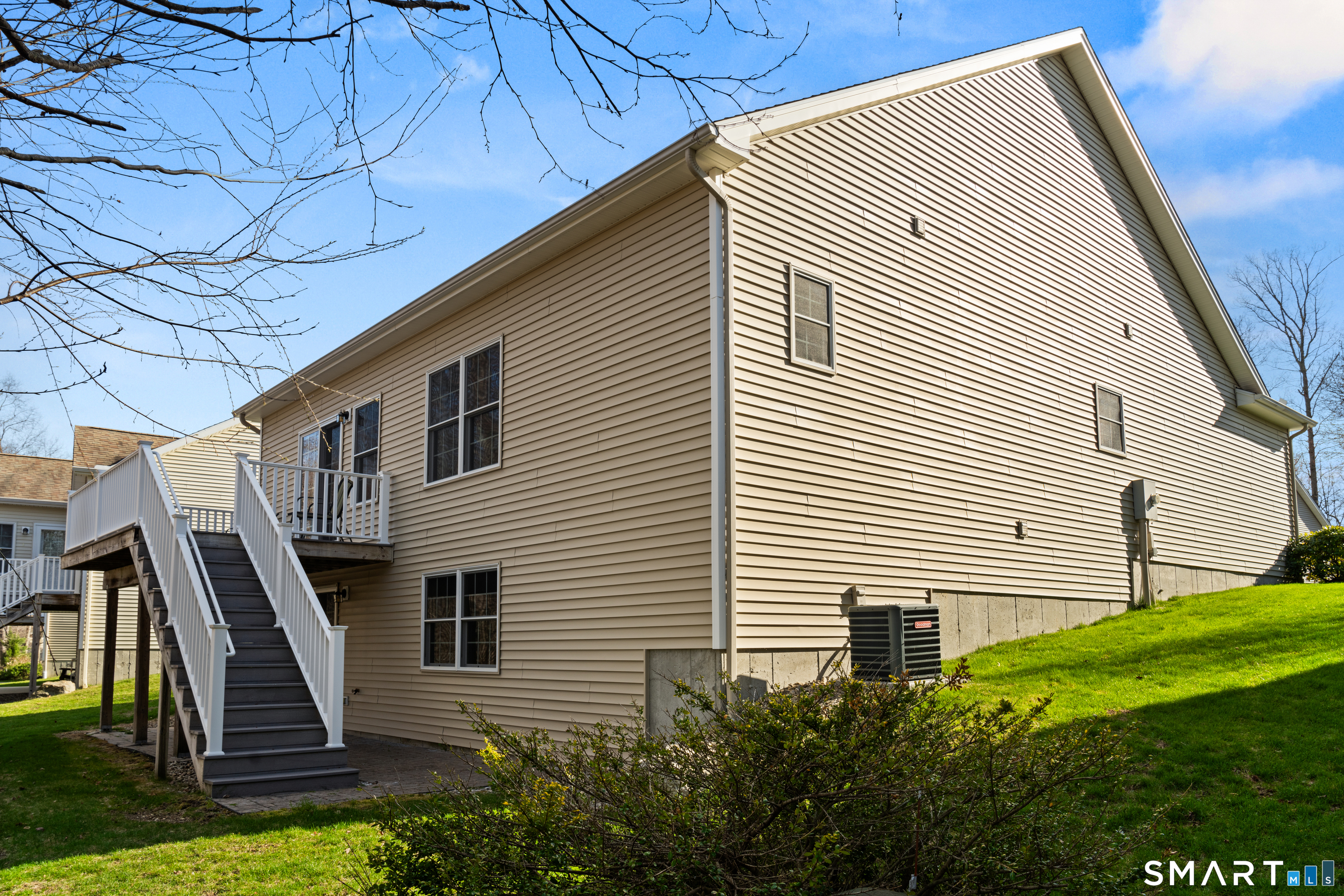 24 Center Court, Unit 24 Colchester, CT 06415 - Photo 6 of 36 a view of a house with backyard