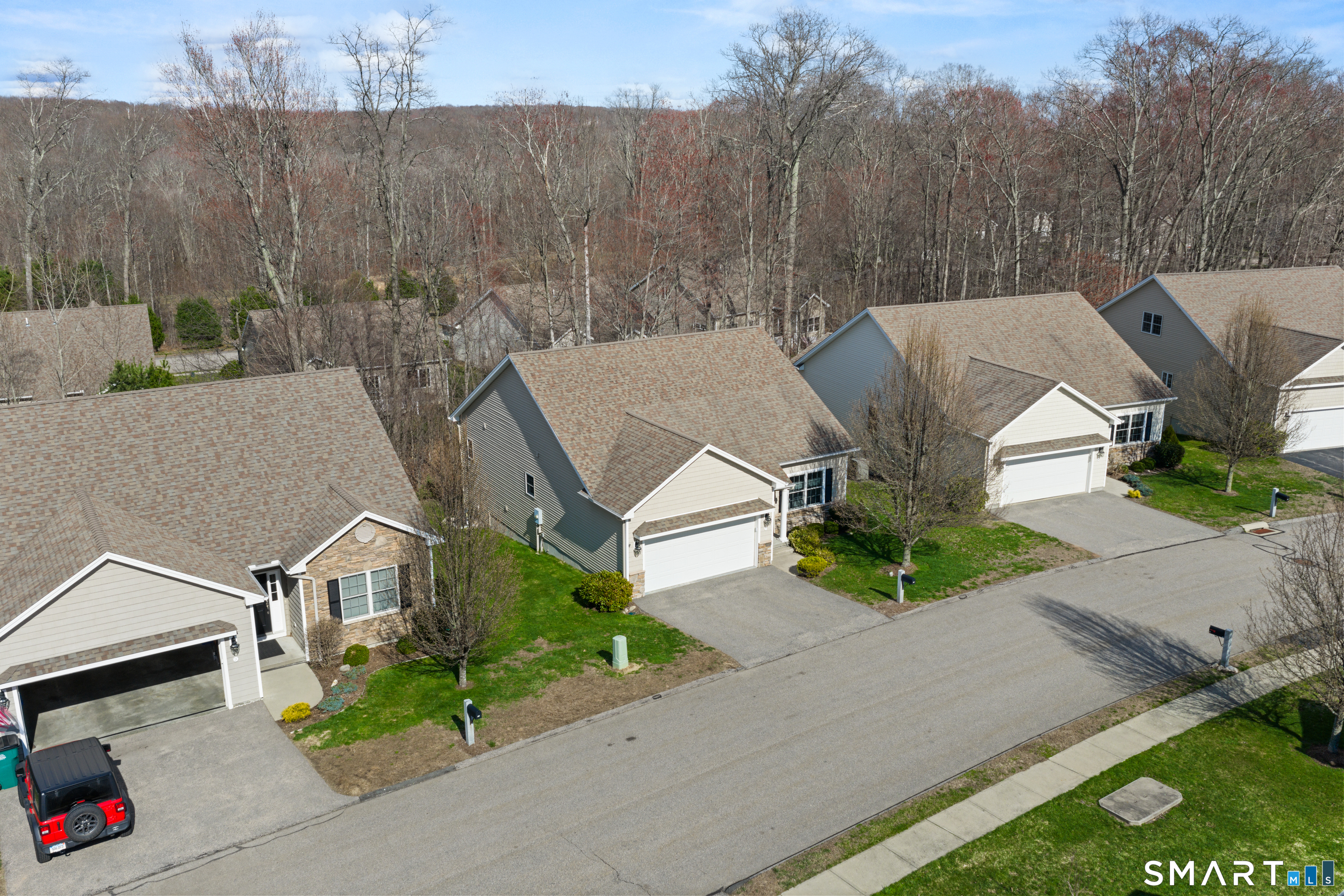 24 Center Court, Unit 24 Colchester, CT 06415 - Photo 7 of 36 an aerial view of a house with a yard