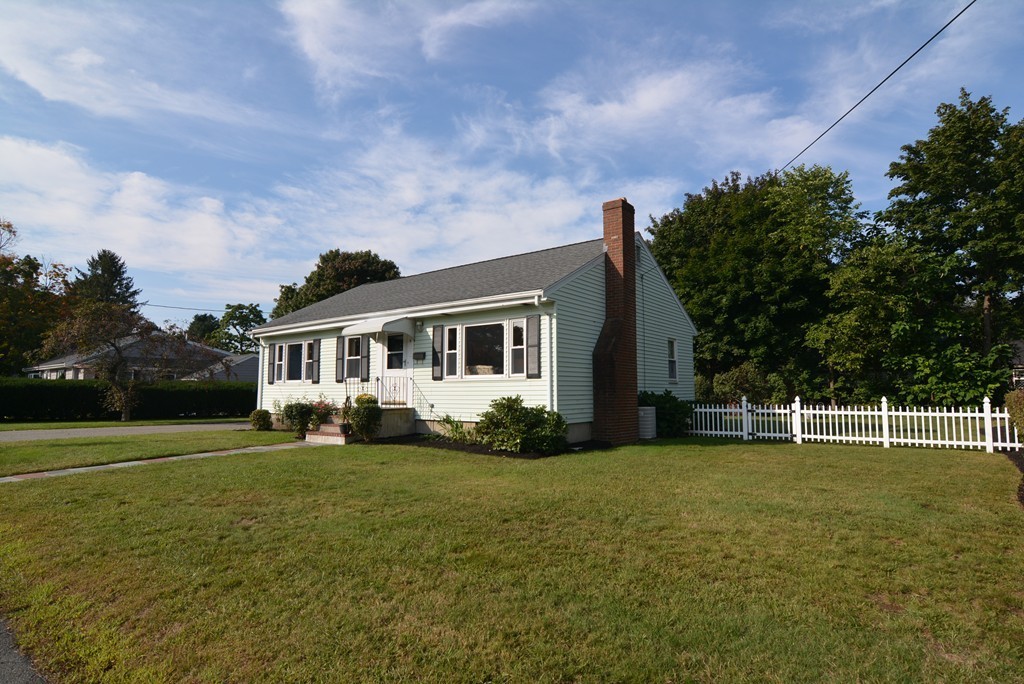 6 Cardinal Road Stoneham, MA 02180 - Photo 23 of 27 a front view of a house with a garden